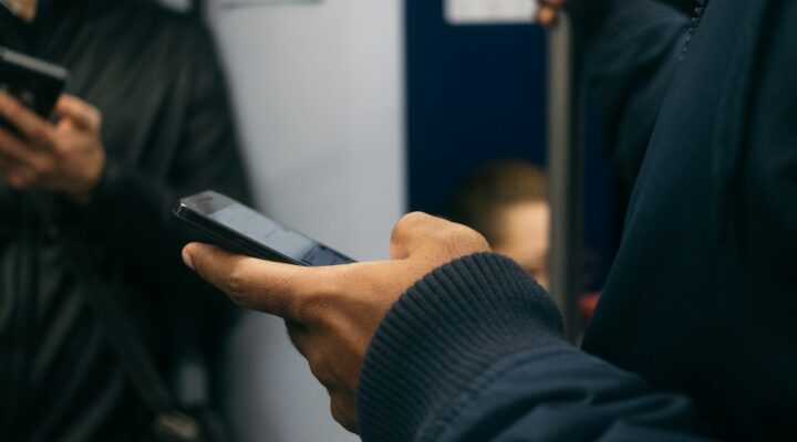 man using Android smartphone